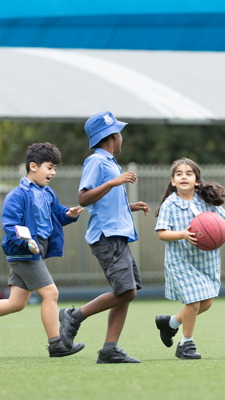 Sacred Heart Mt Druitt students playing with basket ball