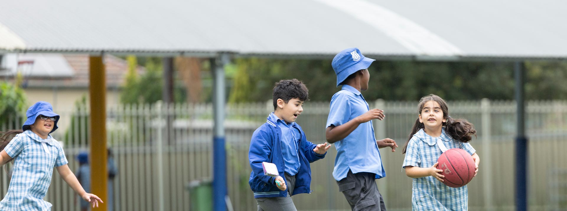 Sacred Heart Mt Druitt students playing with basket ball
