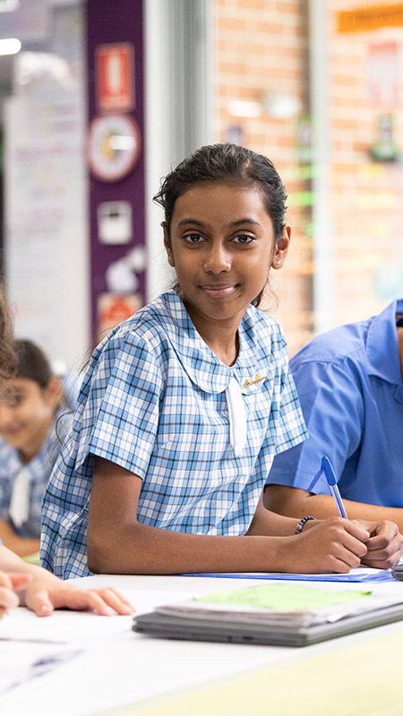 Sacred Heart Mt Druitt Primary student in class
