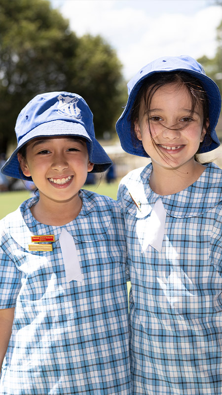 Sacred Heart Mt Druitt students playing on sports field