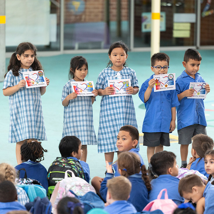 Sacred Heart Mt Druitt students receiving merit award